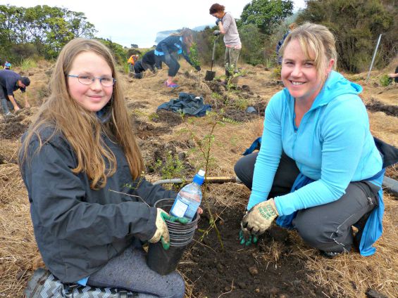 Lisa Pellowe and her daughter Emma Billington transforming Whakaipō Bay one plant at a time.