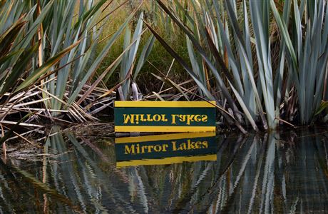 mirror lakes fiordland walk nz national park milford sound sign