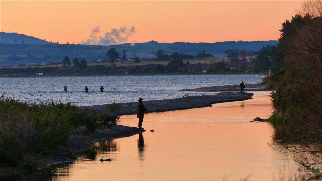 Anglers line up at the Waitahanui mouth. 