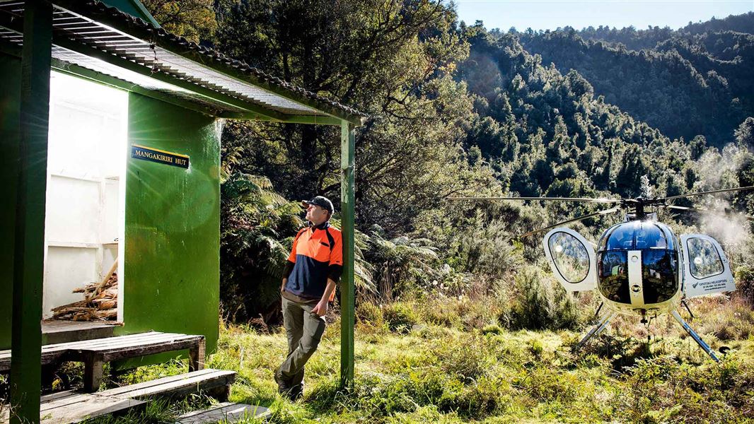 Mangakirikiri Hut with helicopter. 