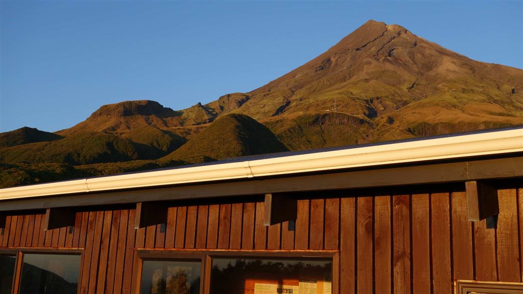 Mt Taranaki behind Maketawa Hut. 