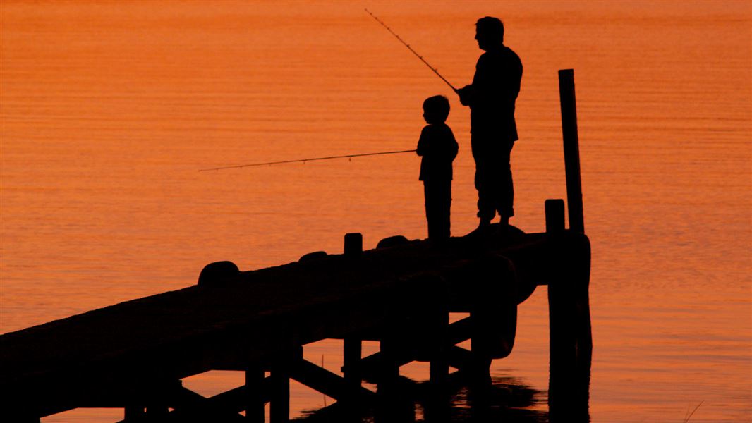 Man and boy fishing. 