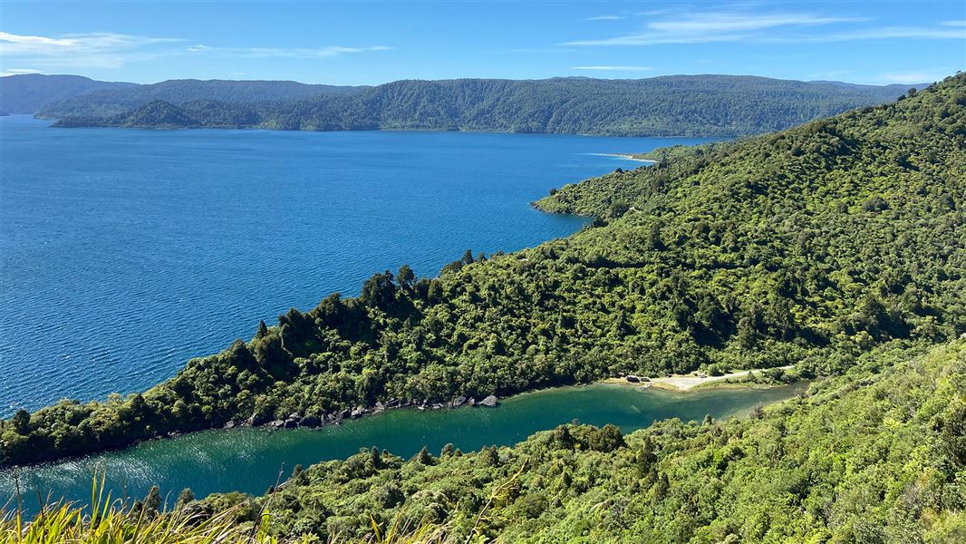 Bay and tree covered hills