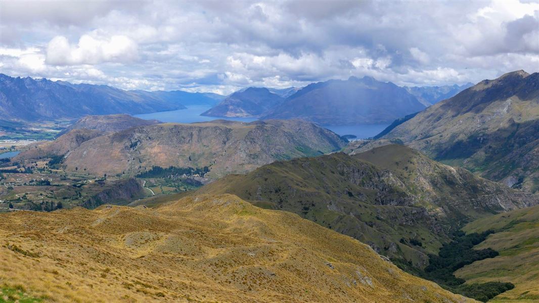 View out over valley and mountains towards Lake Wakatipu.