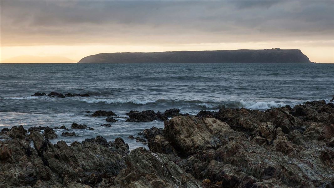 Mana Island at sunset, viewed from Porirua. 