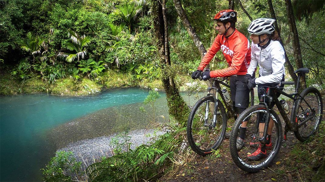 Two cyclists on the Pakihi Track. 