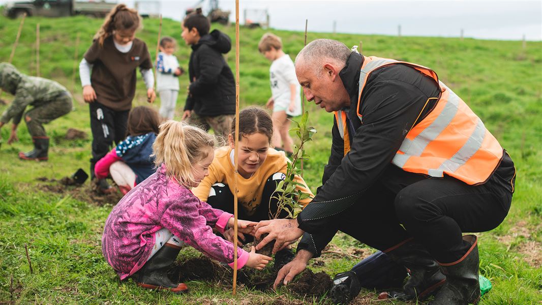 Children planting trees.