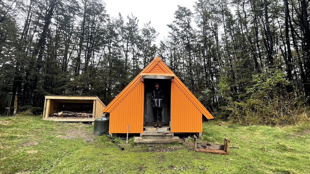 Orange A frame DOC hut. 