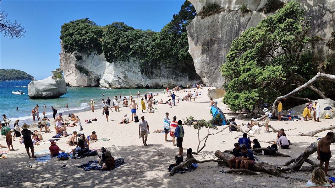 Visitors at  Mautohe Cathedral Cove.