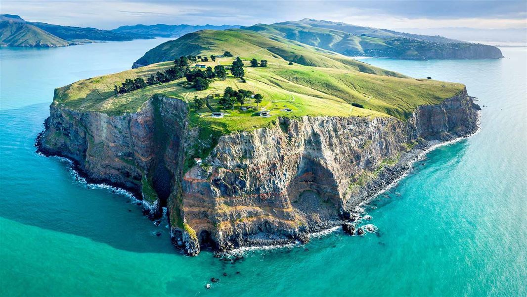 Aerial panorama of Godley Head Awaroa located at entrance of Lyttelton Harbour (Whakaraupo). The Historic gun emplacements can be viewed in the centre of the image.