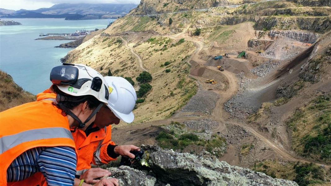 Placing artificial habitats for geckos around the Gollans Bay quarry.