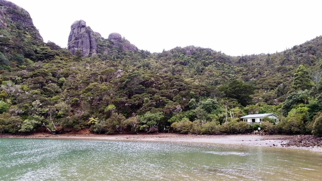 Lane Cove Hut at edge of water. 