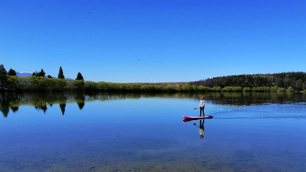 Paddleboarder on Lake Middleton