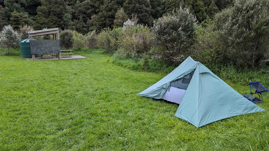 Lone tent near the cooking shelter