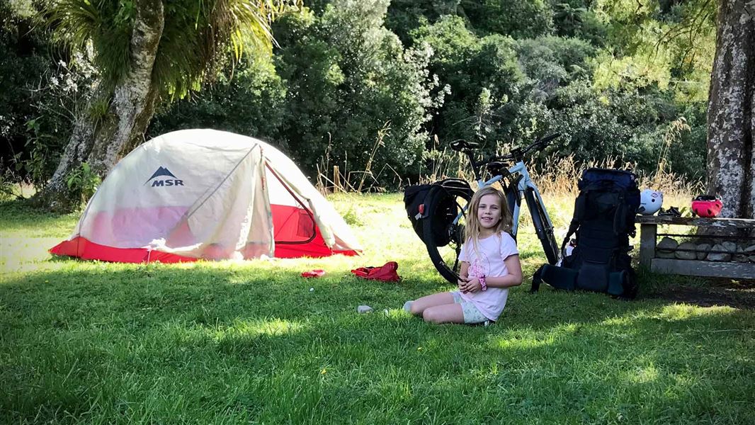 Small child at a camp spot at Boilles Campsite.