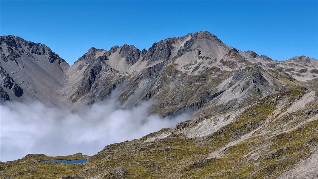 Mountain range above cloud. 