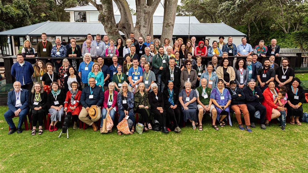 A large group of people pose for a photo