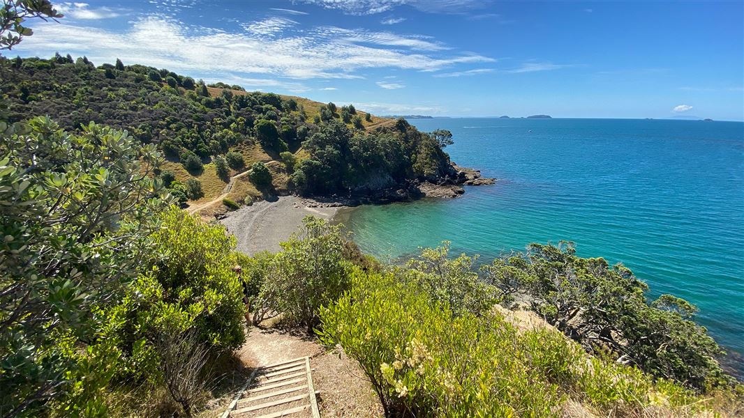 View of sea from hill.